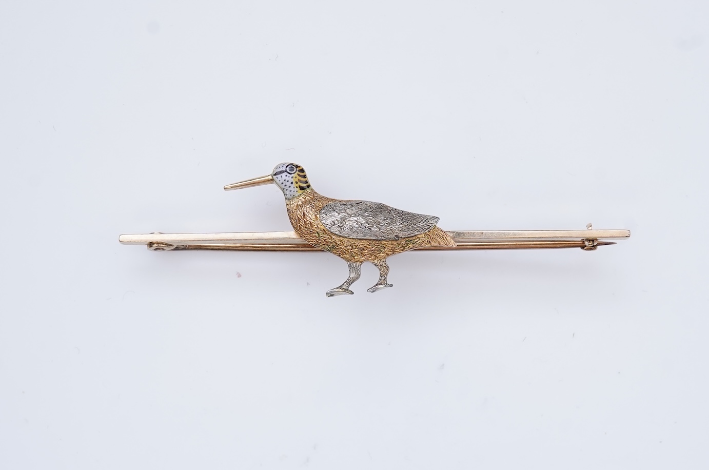 A gold and enamel brooch, circa 1900